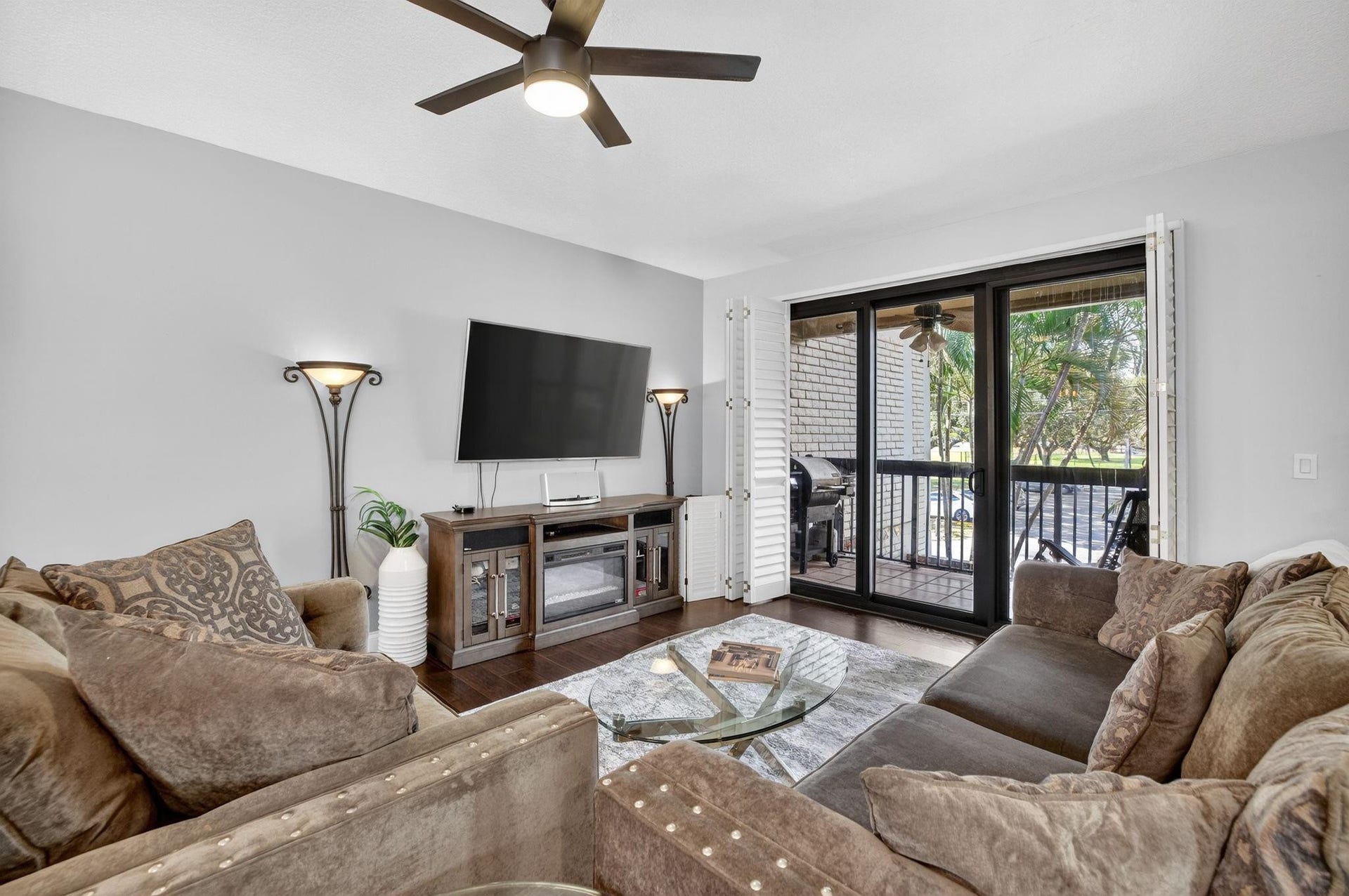 1401 NE 9th Street, #13, Fort Lauderdale, FL 33304 Living Area with private balcony overlooking Holiday Park.