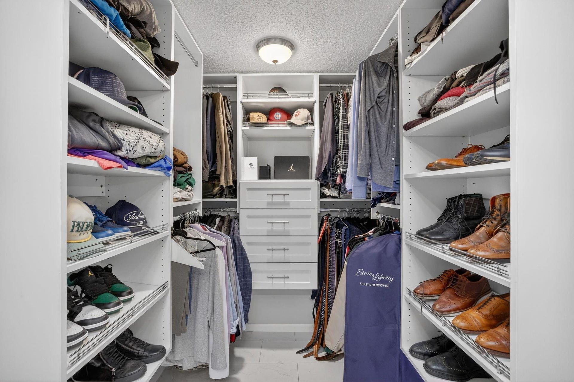 1401 NE 9th Street, #13, Fort Lauderdale, FL 33304 Primary Bedroom Built-Out Closet.