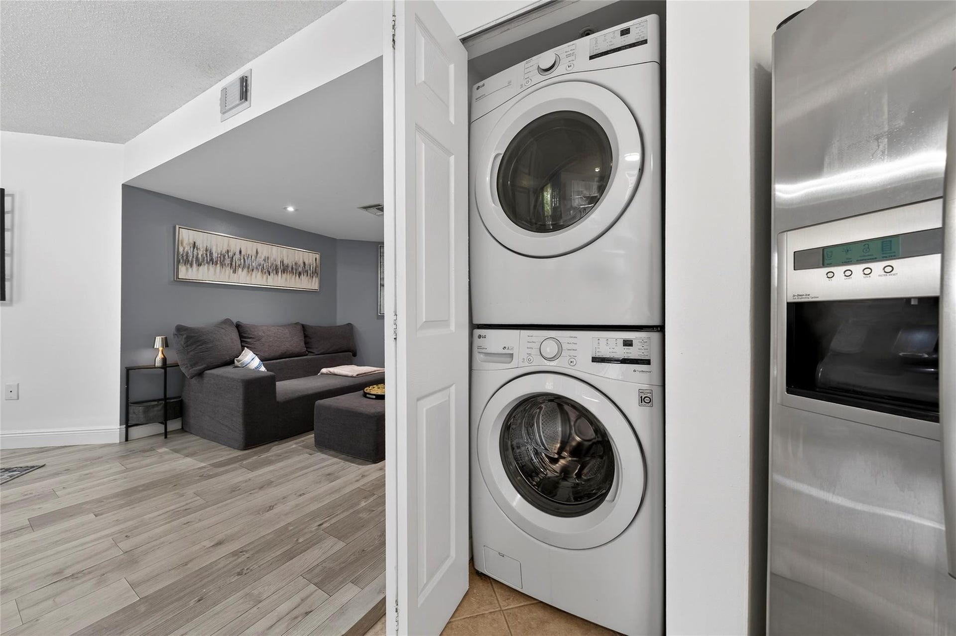 520 SE 5th Avenue, #2404, Fort Lauderdale, FL 33301 Convenient in-unit laundry with stacked washer and dryer discreetly tucked away, offering everyday ease without sacrificing living space.