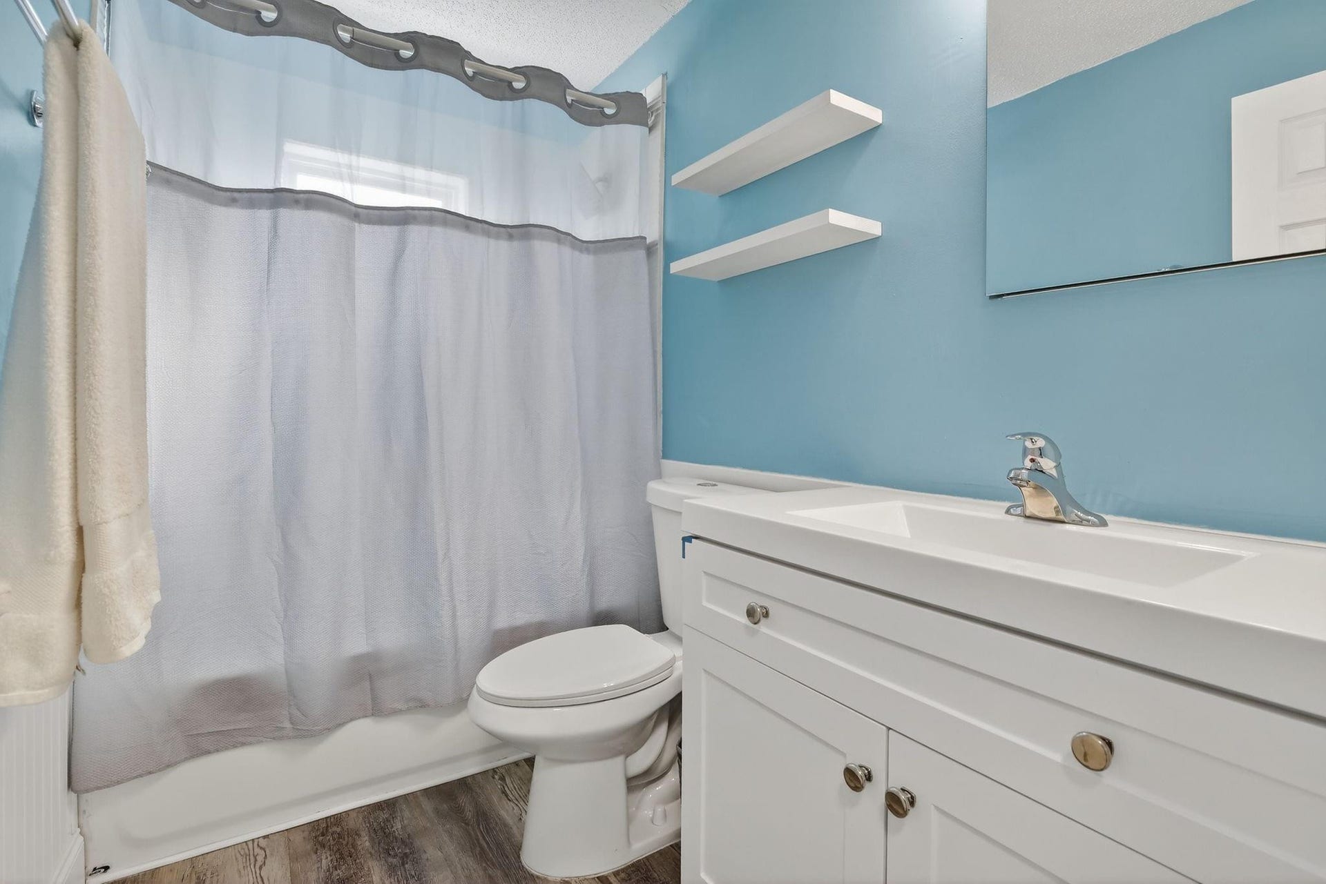8845 NW 14th Street, Plantation, FL 33322 Updated bathroom with NEW vanity and shower fixtures