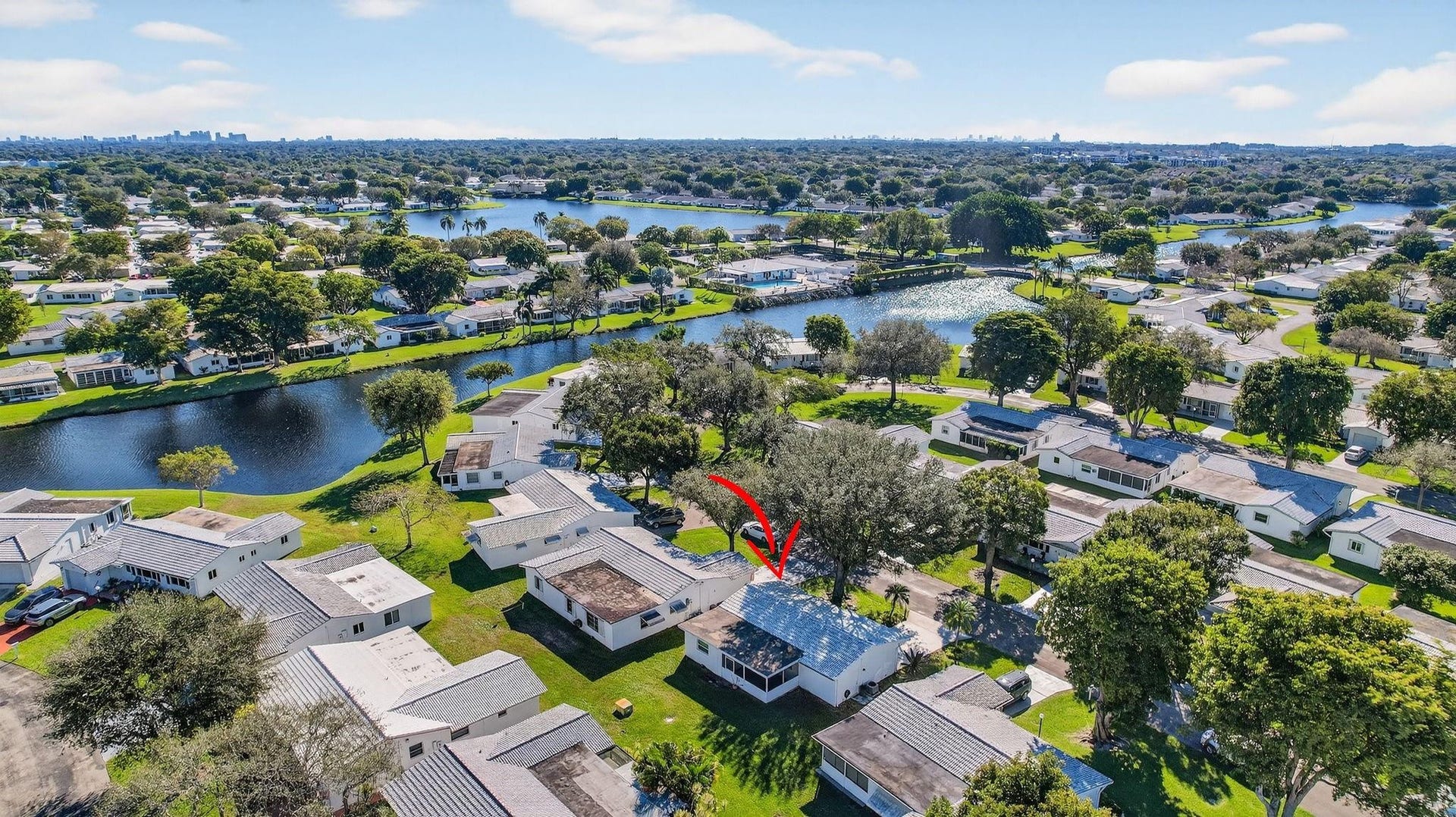 8845 NW 14th Street, Plantation, FL 33322 Tree lined streets wind through this Adult Community