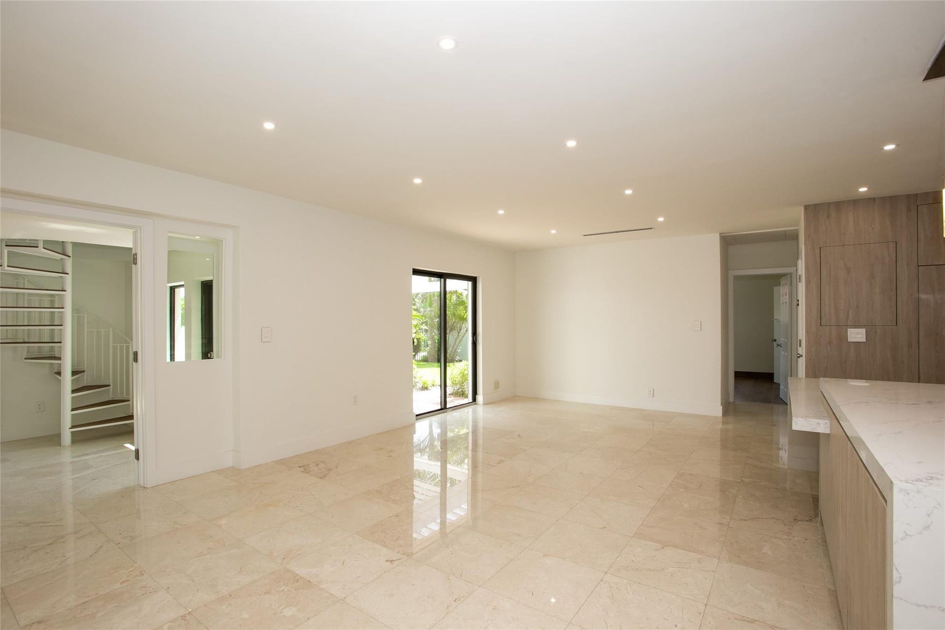 Living area with waterviews form every opening