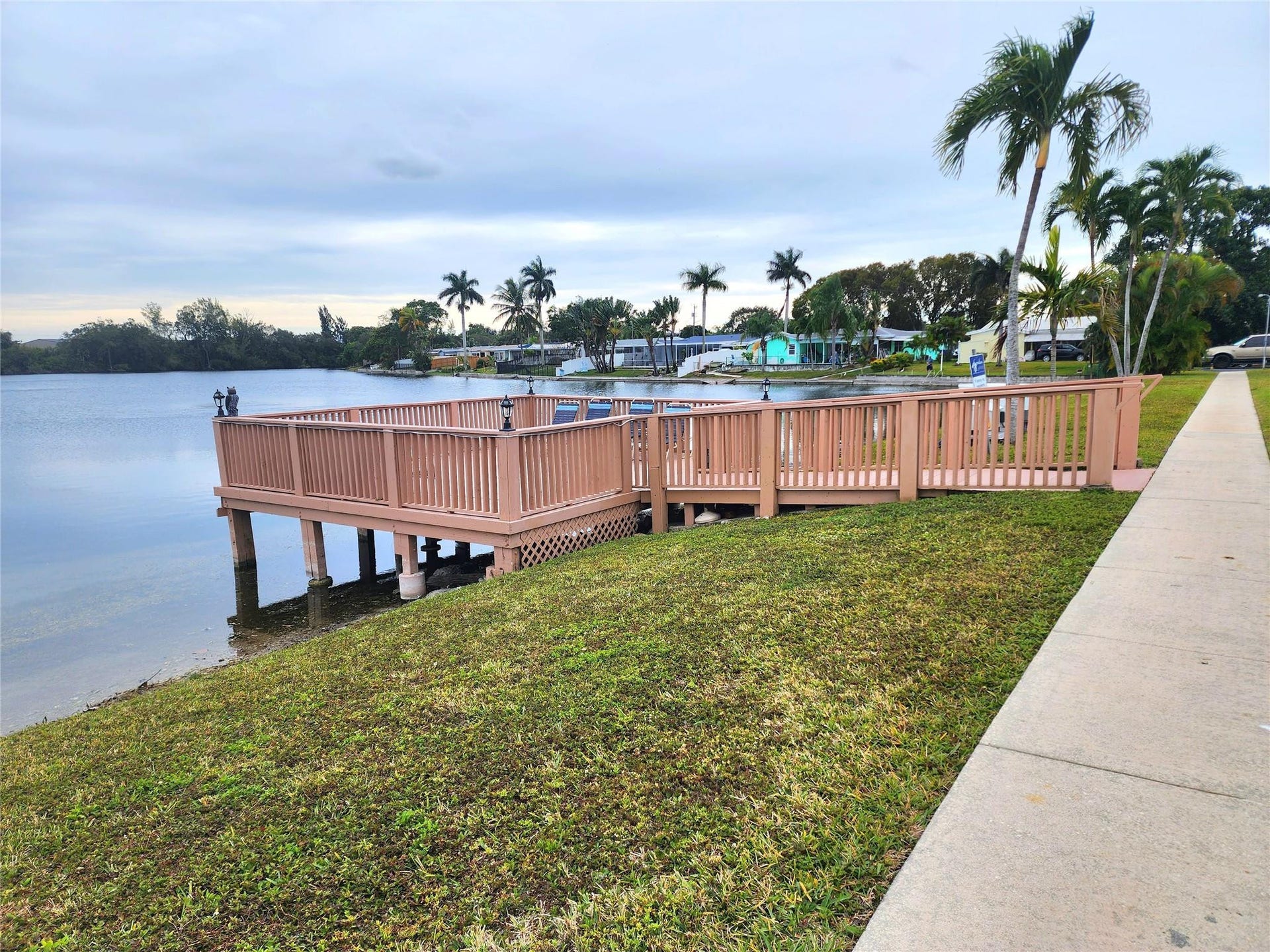 2223 Park Lane, #105, Hollywood, FL 33021 The deck enjoys expansive lake views and fishing is permitted. Bring a book or your favorite beverage to enjoy the perfect waterfront spot.
