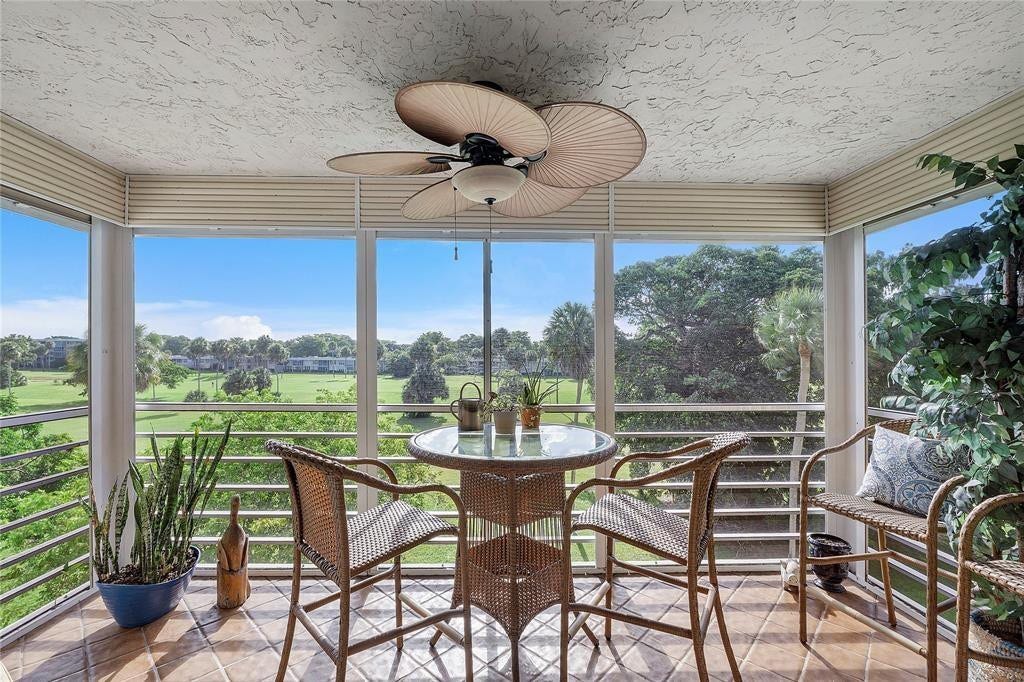 804 Cypress Grove Lane, #407, Pompano Beach, FL 33069 Fantastic screened in porch.