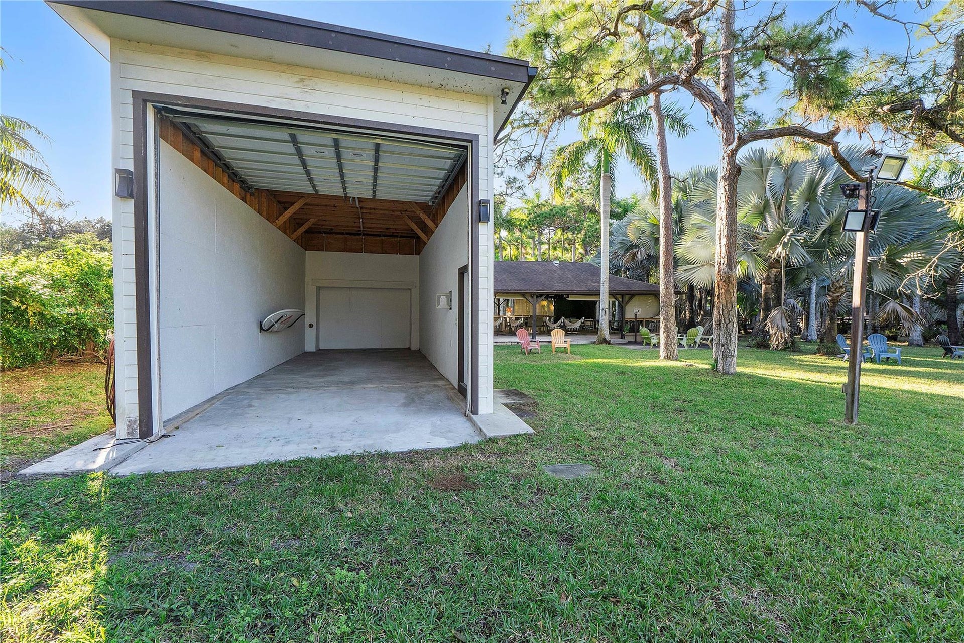 5351 Godfrey Road, Parkland, FL 33067 The back garden has a huge RV hanger with full electrical& plumbing facilites, or you could turn it into a barn,