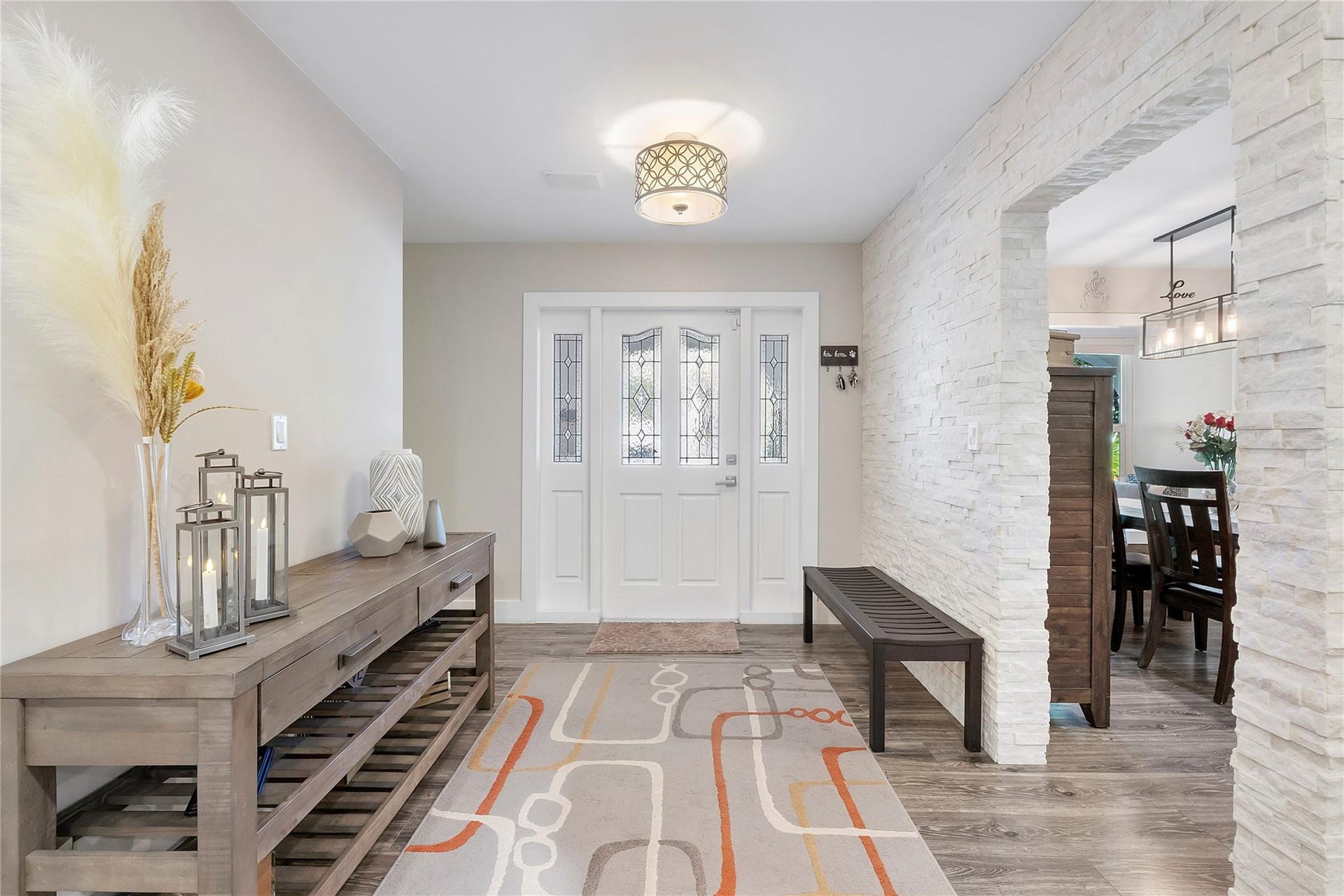 5351 Godfrey Road, Parkland, FL 33067 As you enter this doorway you are met with a sprawling open floor plane of areas for all the family combined, This is the interior entryway as you come into the home,