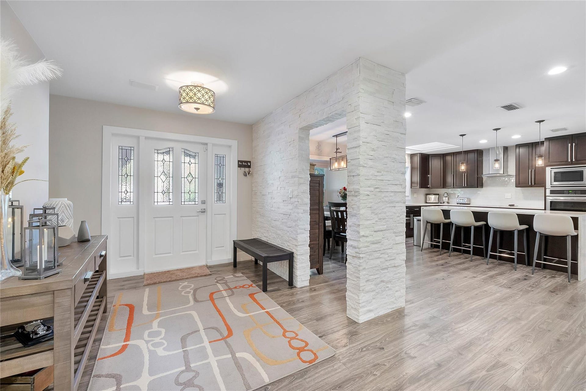 5351 Godfrey Road, Parkland, FL 33067 The stylish modern stone archway to your left as you walk in is part of accent walls and doorways throught the home
