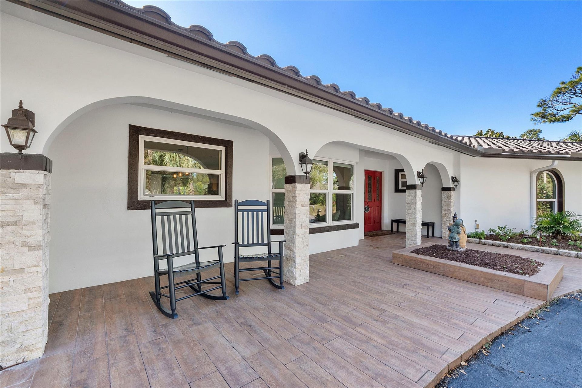 5351 Godfrey Road, Parkland, FL 33067 The Serene front porch to sit and watch the sunrise with your morning coffee