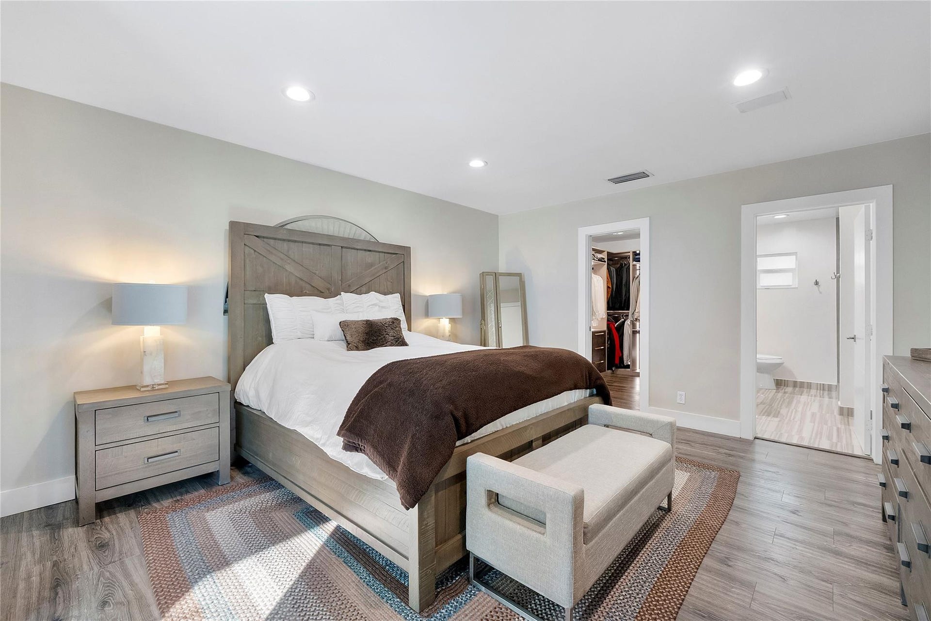 5351 Godfrey Road, Parkland, FL 33067 The Primary Master bedroom has a beautiful ray of sunshine coming through the windows and skylight,