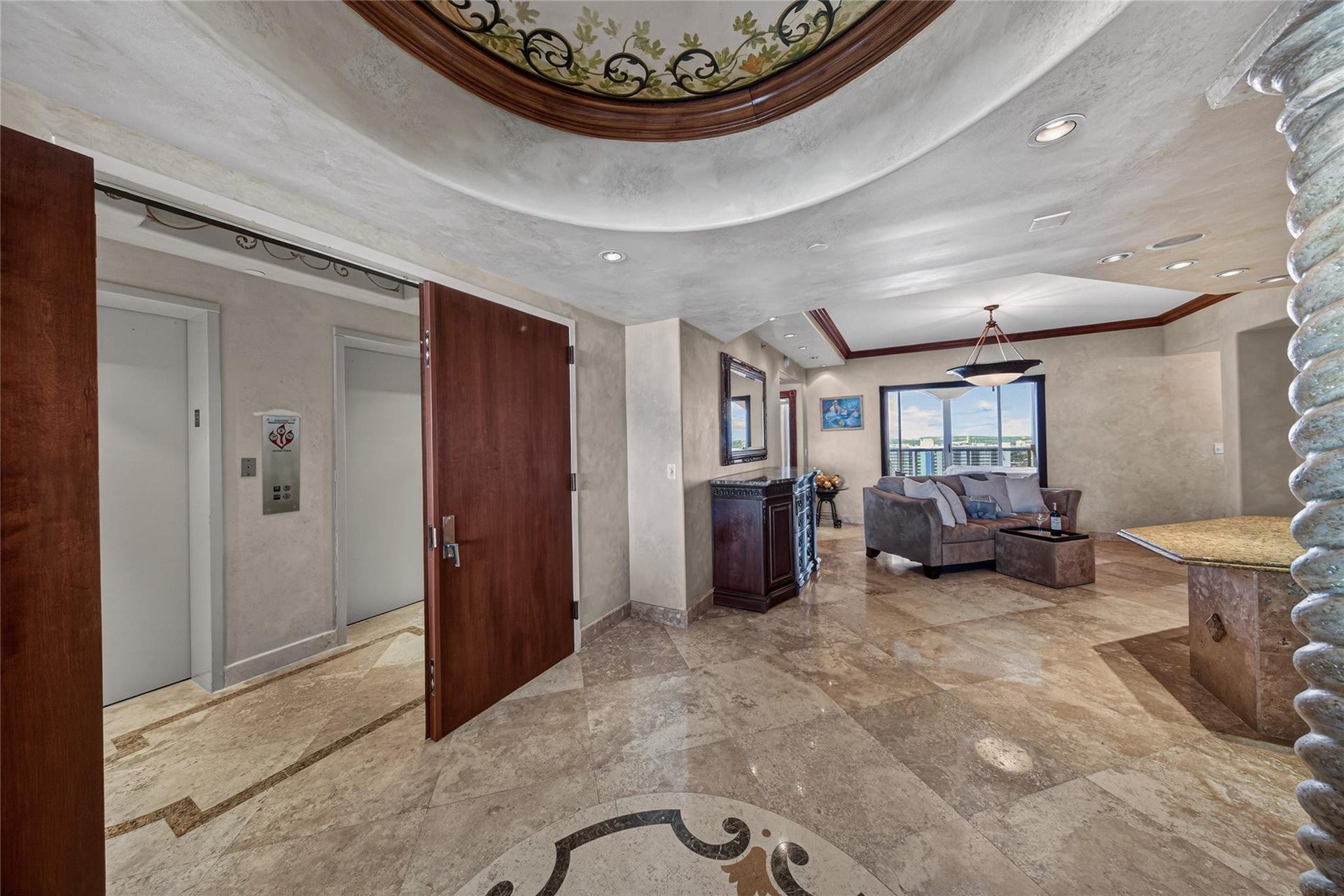 Private Elevator and Entrance into the unit Foyer