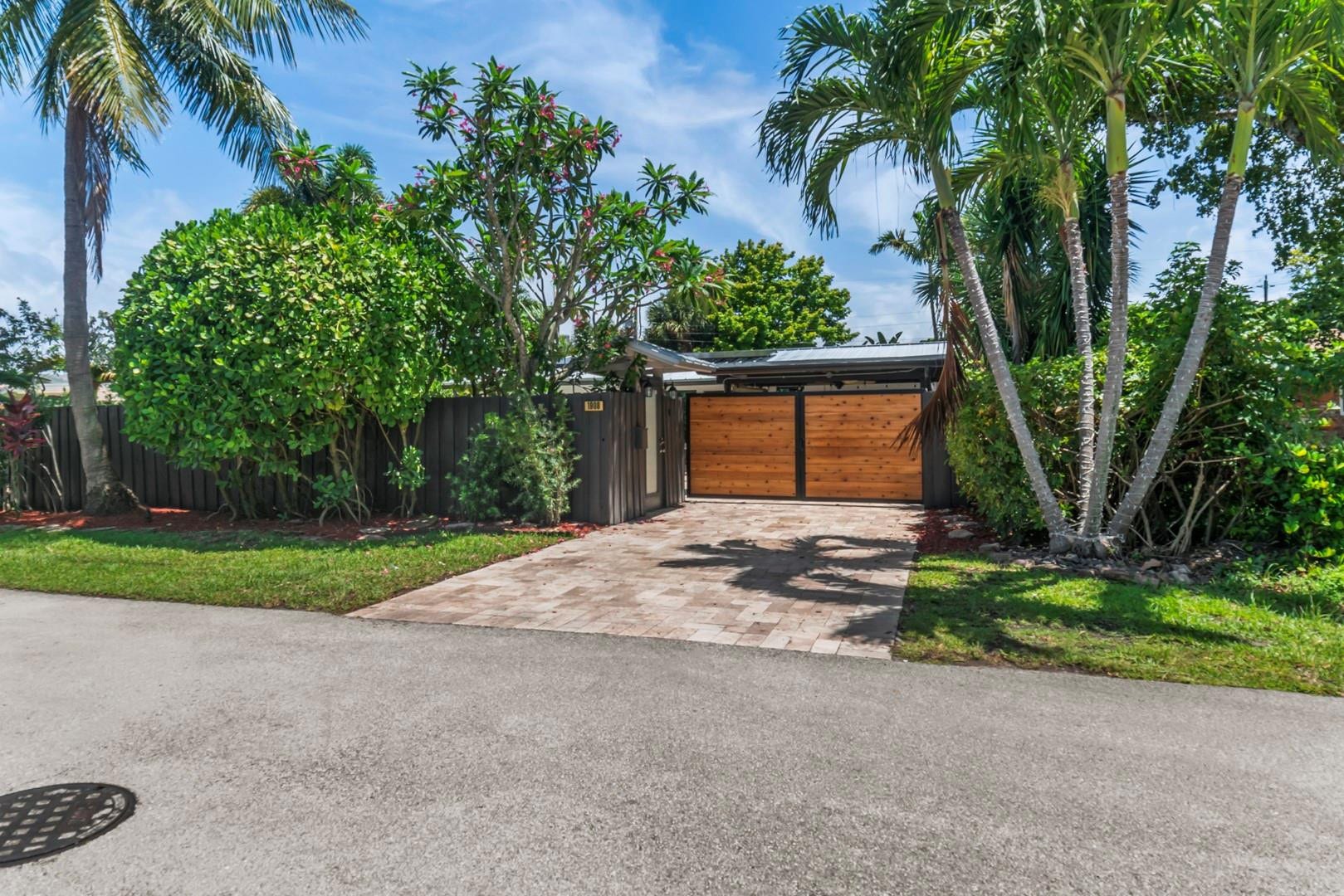 1908 NE 27th Street, Wilton Manors, FL 33306 Double swing gates into covered carport.....