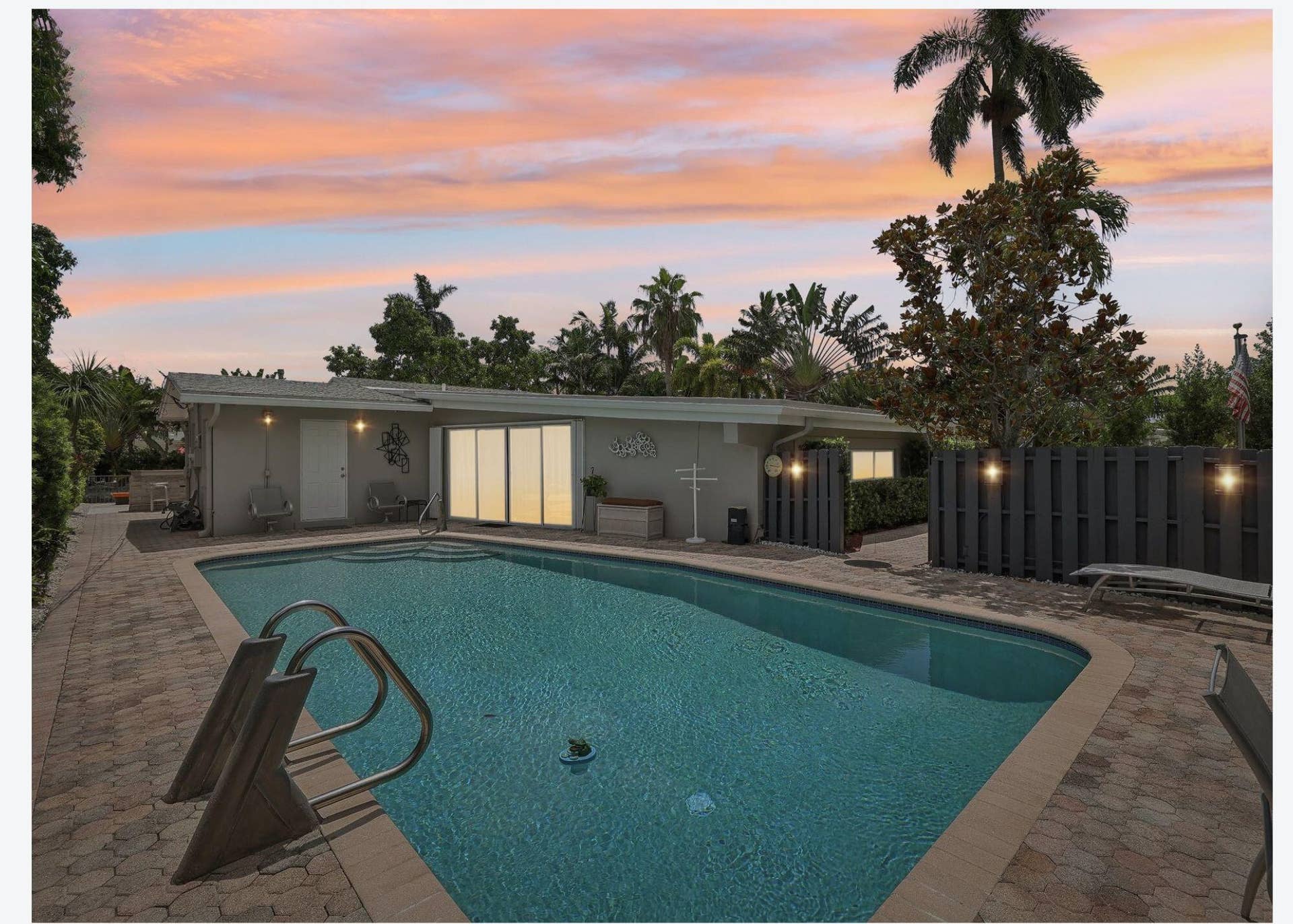 3044 NE 15th Terrace, Oakland Park, FL 33334 pool sunset