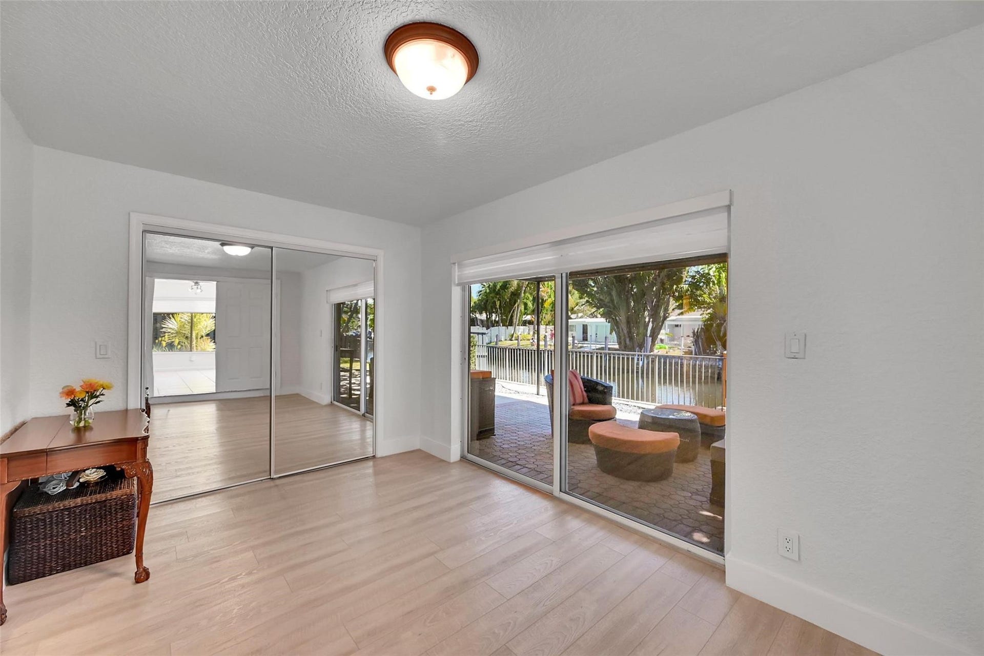 3044 NE 15th Terrace, Oakland Park, FL 33334 Primary suite includes indoor outdoor access