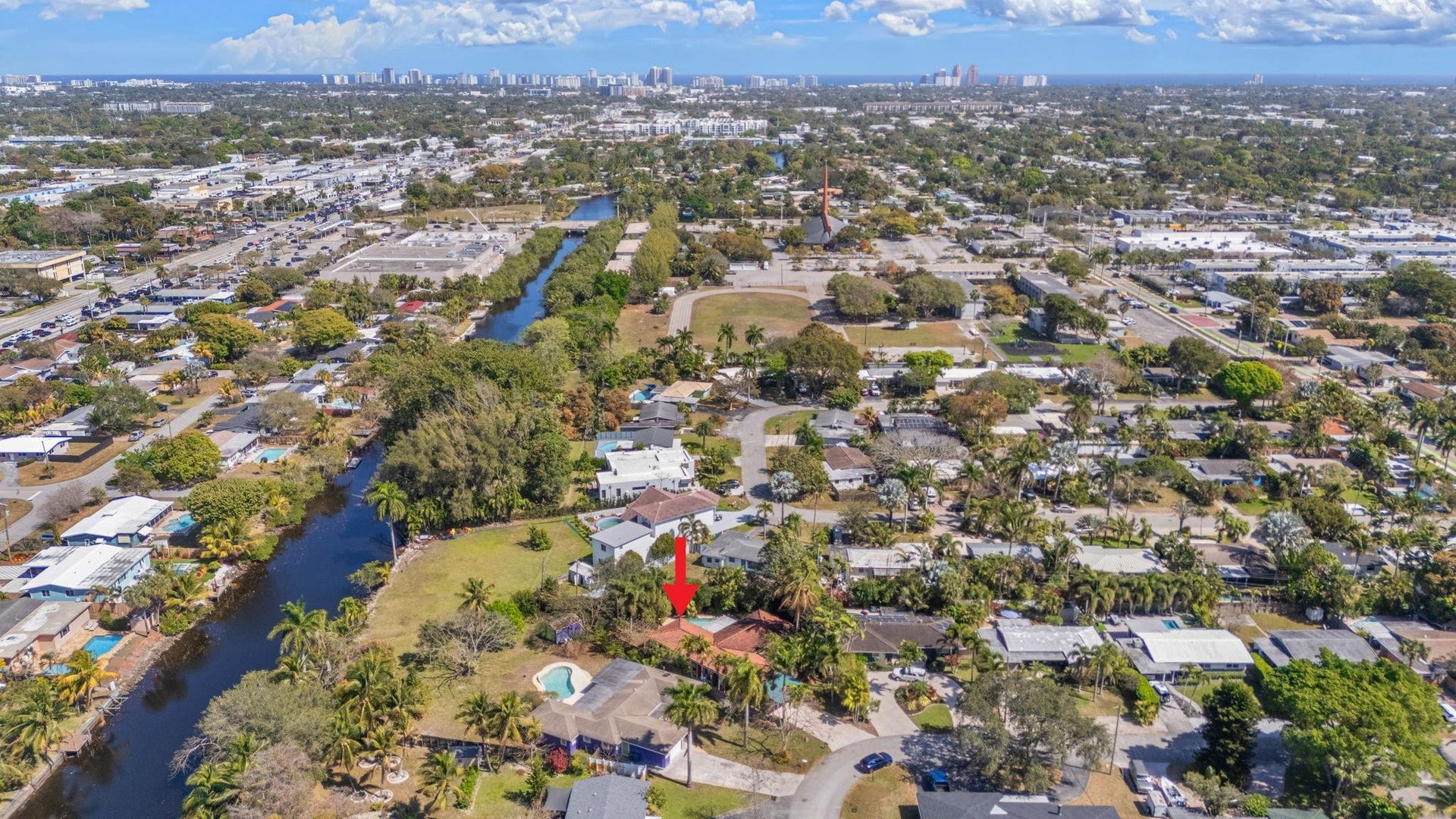 2956 NW 6th Terrace, Wilton Manors, FL 33311 Elevated aerial view highlighting the propertys location within the neighborhood. Nearby waterways, roadways, and surrounding homes provide a clear sense of the area.