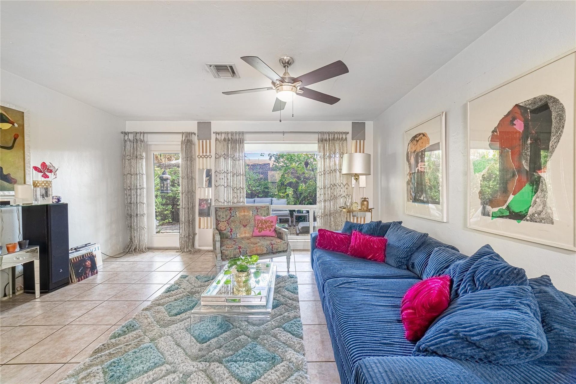 Unit 1013 living room to private patio view.