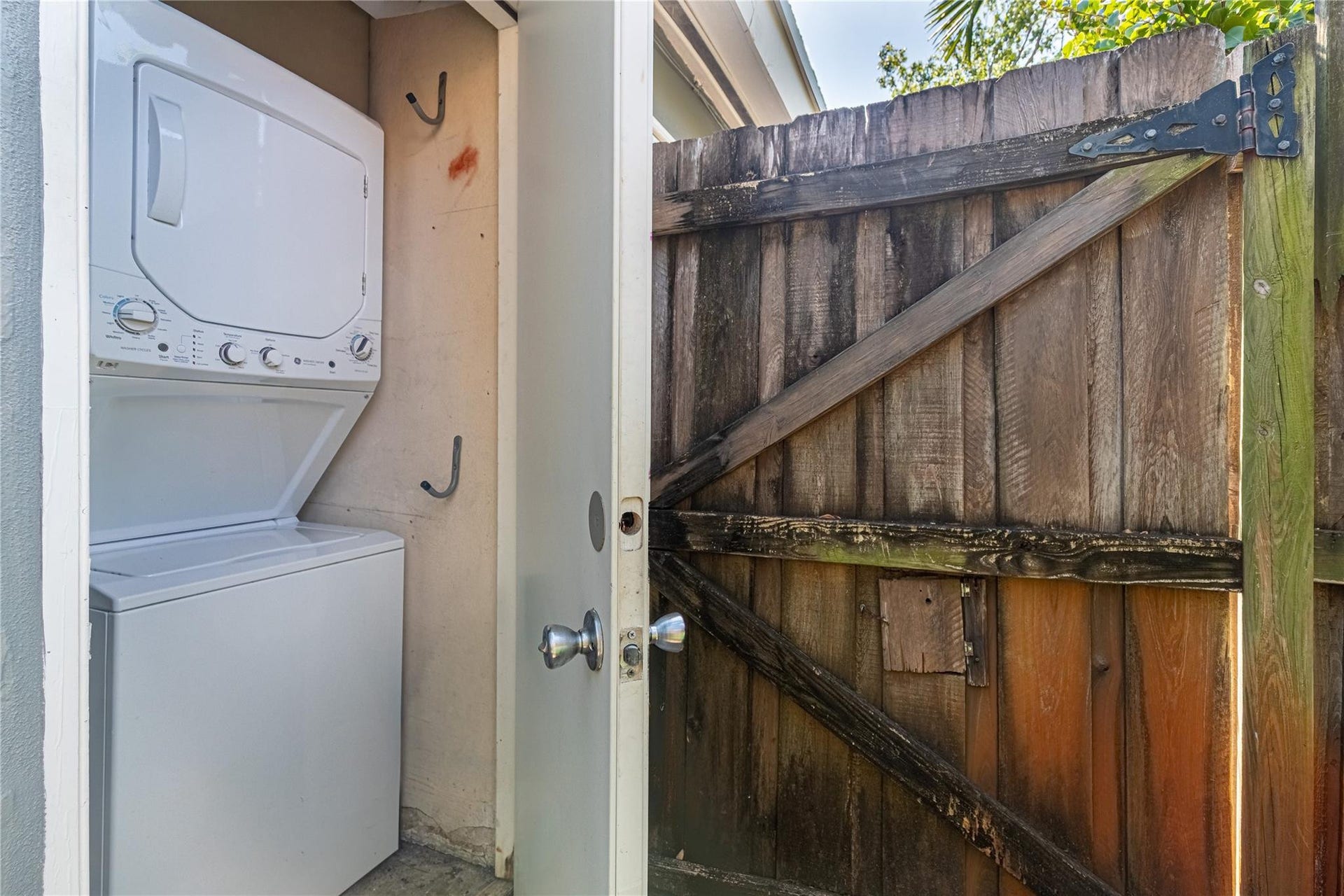 Unit 1013 stackable laundry is located in the closet just inside the entry gate.