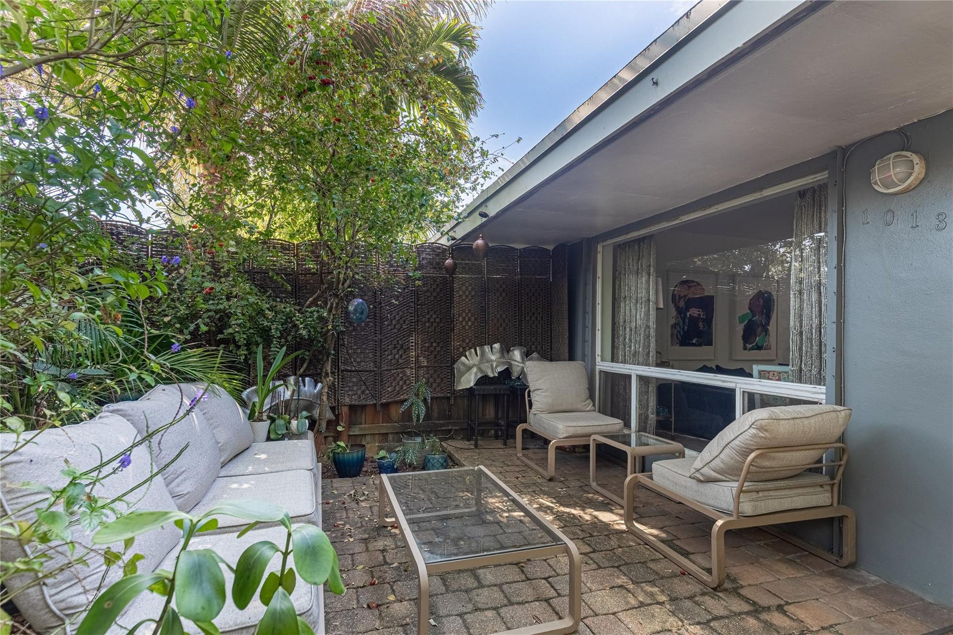 Private patio for unit 1013. Entry/exit door (just to the right) not shown in photo.