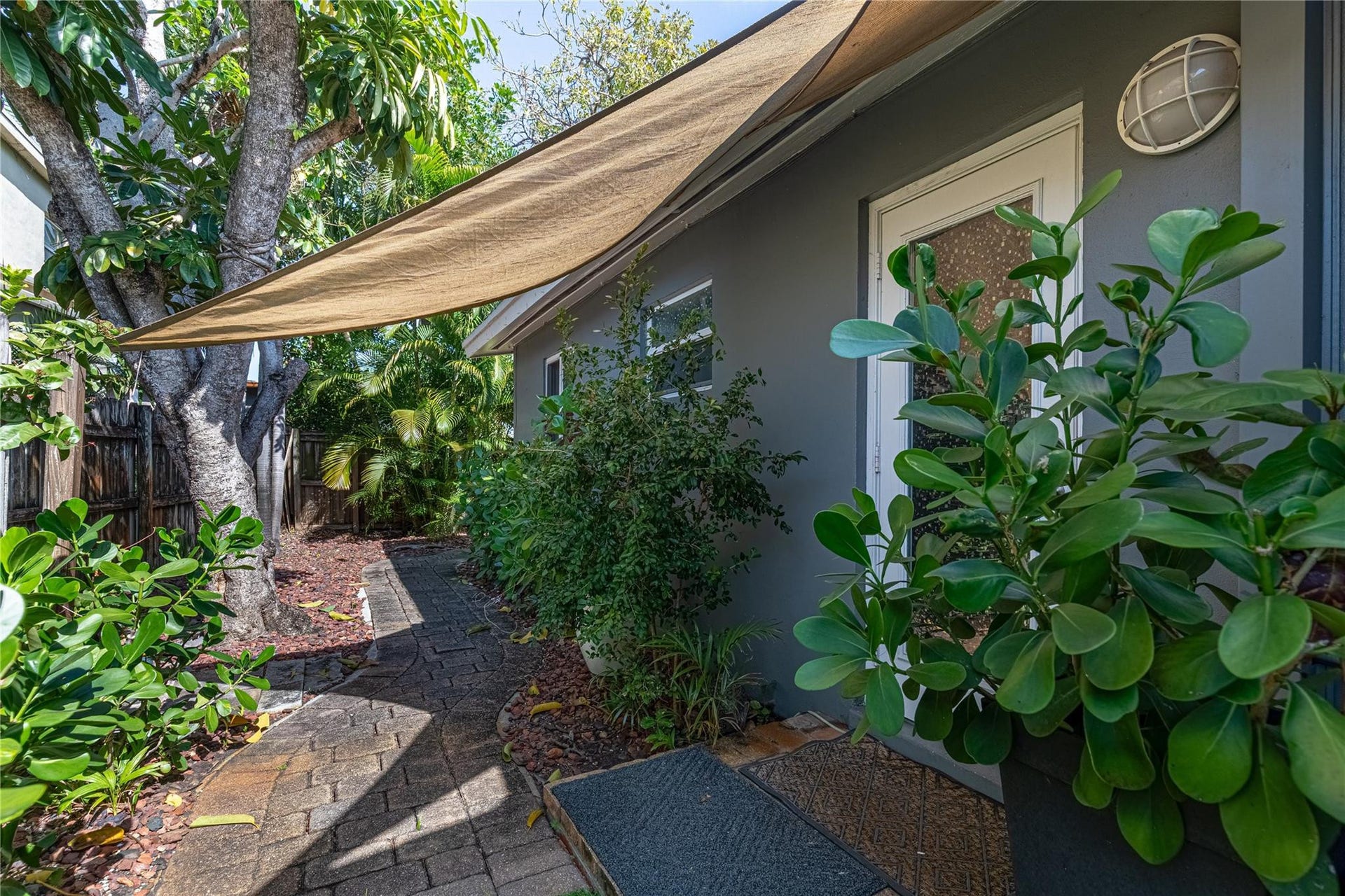 This is the entry from the gate to unit 1013 door and wrap around walkway. Unit is gated and fully fenced.