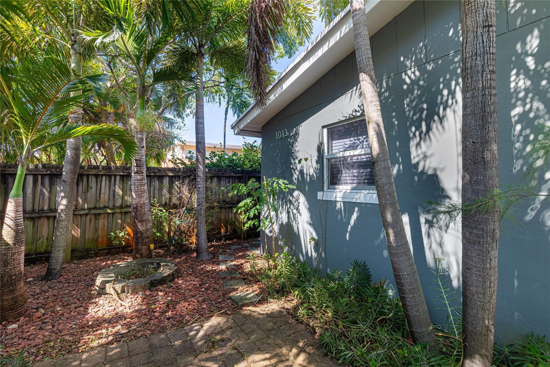 This is the front of unit 1009 that wraps around to the left and has a gate to access the private, stackable laundry.