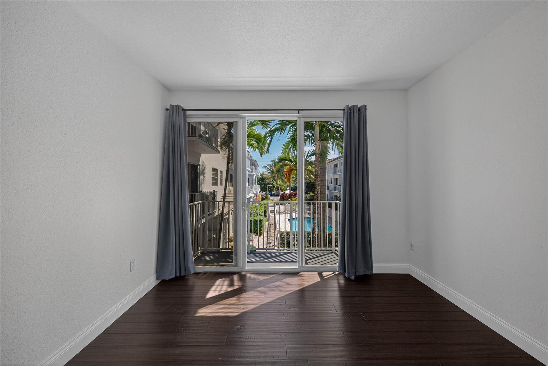 bedroom overlooking pool area