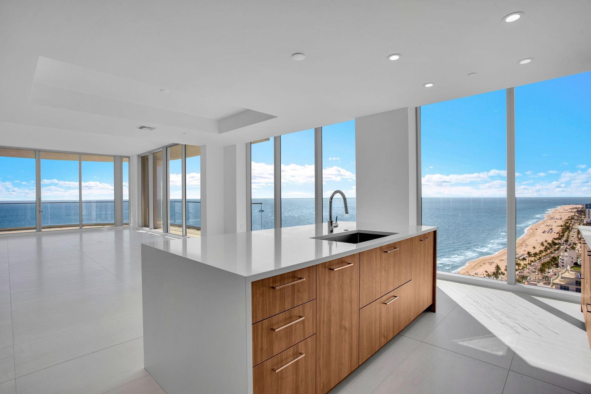 Island, dining, and living area