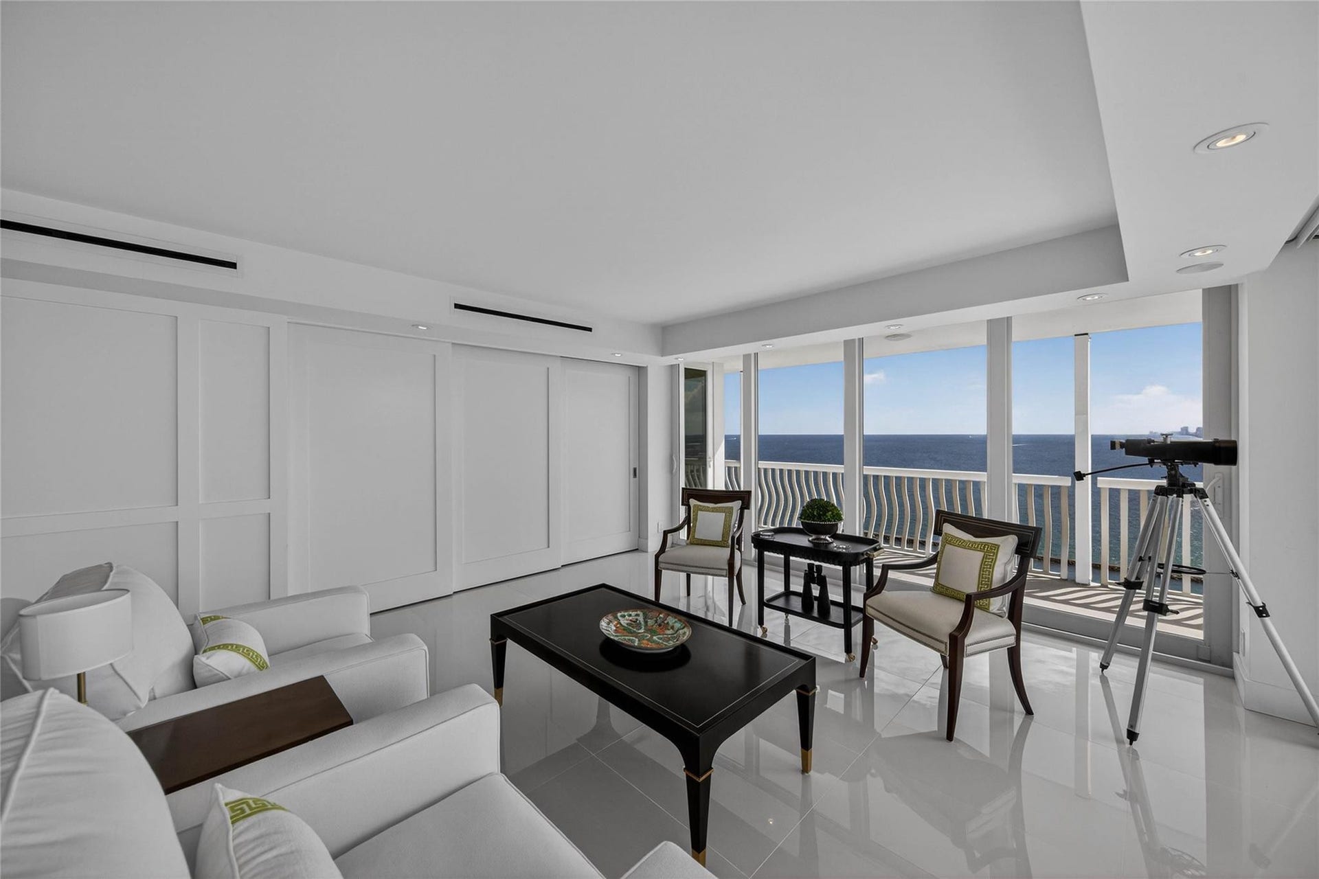 Living Room with Sliding Wall System To Den Closed