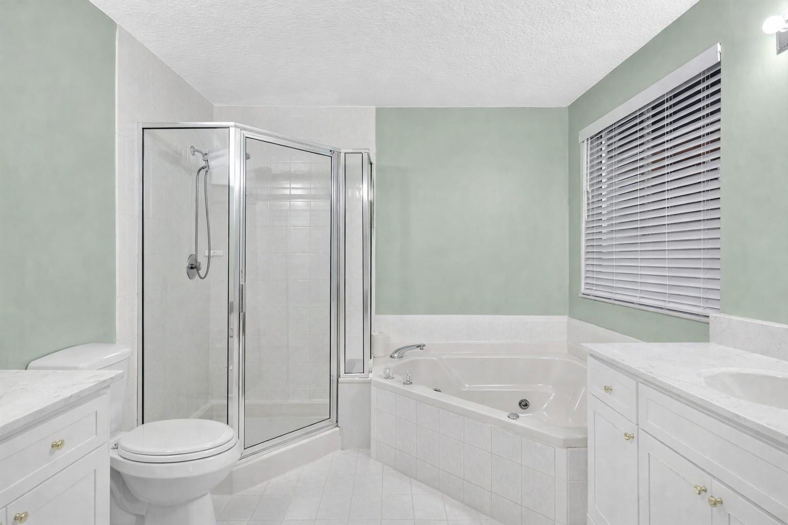 11240 Reveille Road, Cooper City, FL 33026 There is a separate tub and shower.