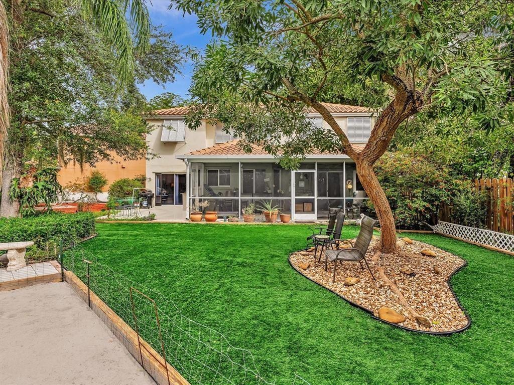 11240 Reveille Road, Cooper City, FL 33026 Artificial grass means no watering, cutting, fertilizing...