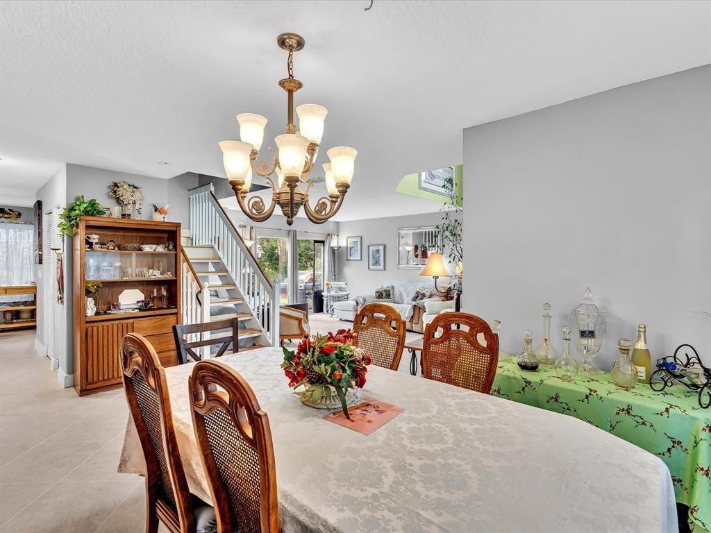 11240 Reveille Road, Cooper City, FL 33026 I always had the table set up for 10. It's a great size for those big dinners.