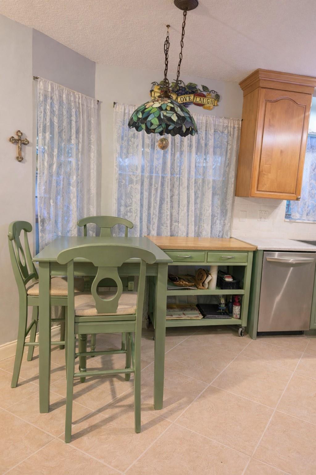 11240 Reveille Road, Cooper City, FL 33026 Creates a bigger work space. There is additional counter and bar to sit at.