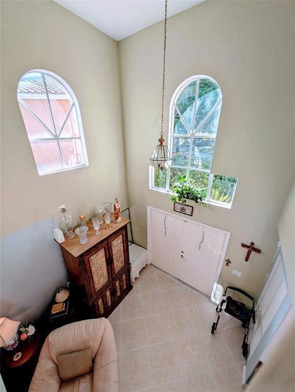 11240 Reveille Road, Cooper City, FL 33026 Looking down at the foyer. They also use this as a laundry drop. You'll see when you come.