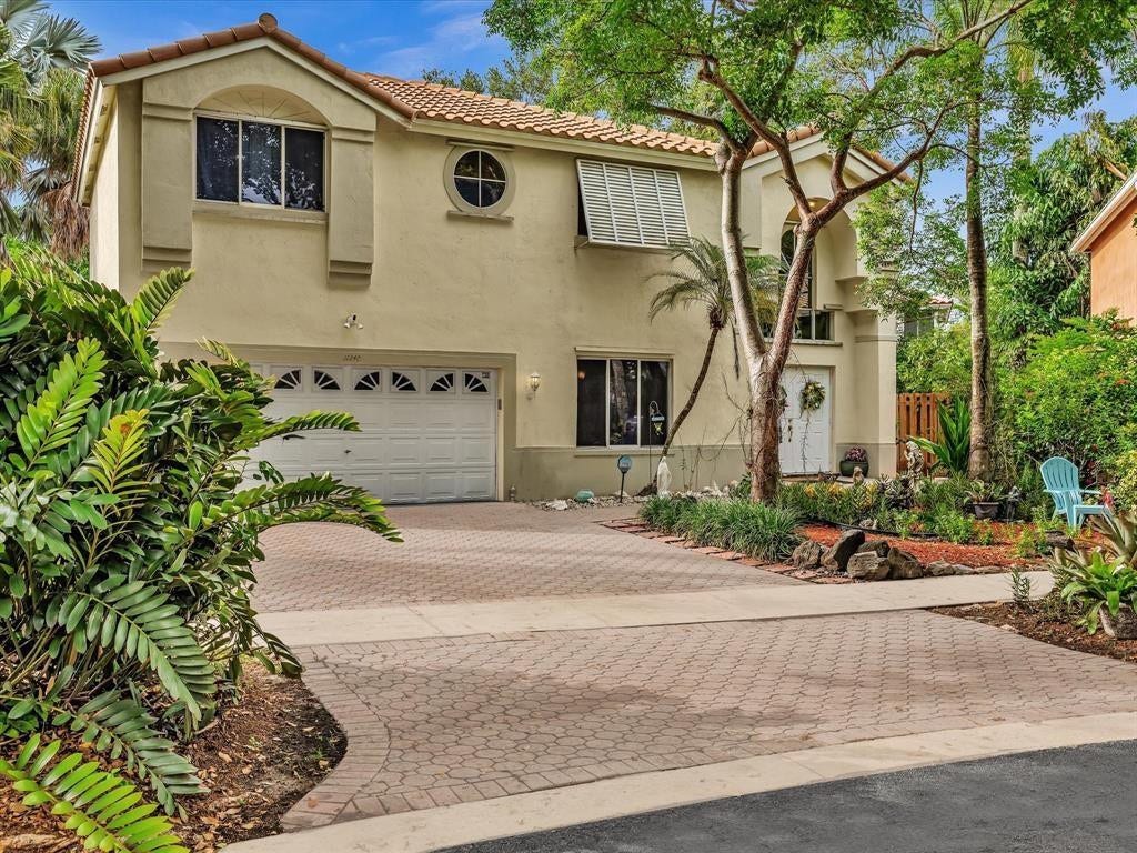 11240 Reveille Road, Cooper City, FL 33026 Driveway for 4 cars and garage for 2.