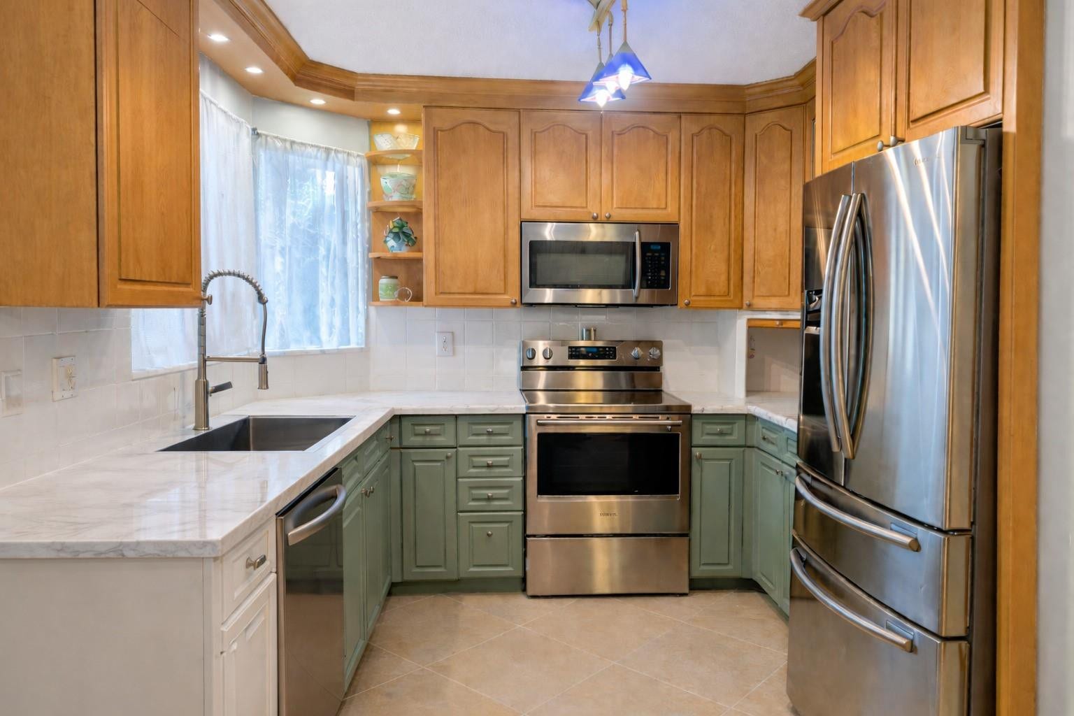 11240 Reveille Road, Cooper City, FL 33026 All kitchen cabinets were CUSTOM BUILT and made a few inches deeper for extra storage.