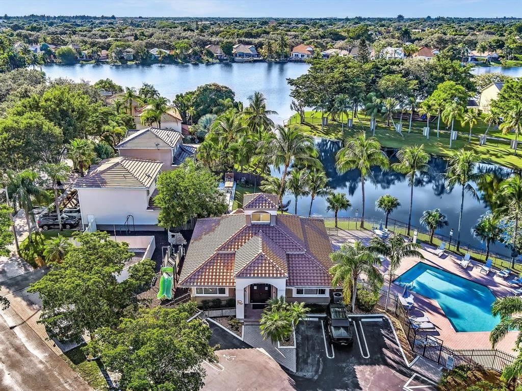 11240 Reveille Road, Cooper City, FL 33026 HOA takes care of Gate, Streets, Suale Trees and Sidewalks + all the other stuff.