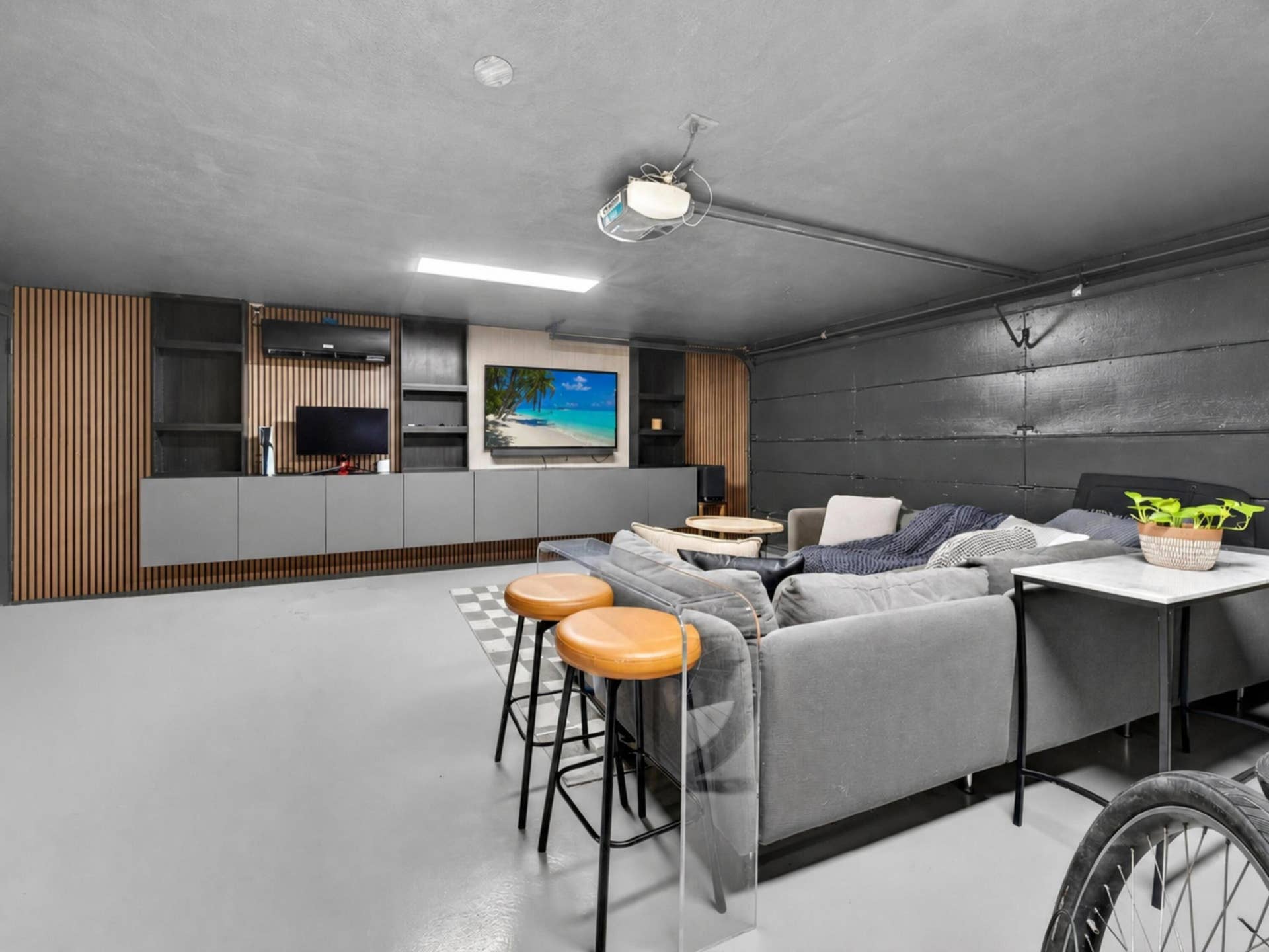 Finished, air-conditioned 462-square-foot bonus room currently used as a media room, offering flexible space for a home office, gym, playroom, or additional living area.