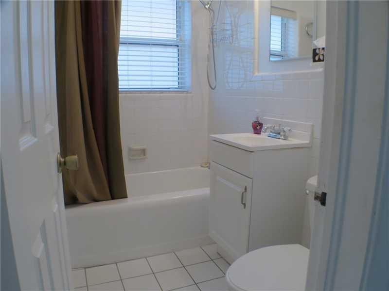 Exterior Front. Guest Bath on ground floors, just outside the 2 guest rooms and office/den.