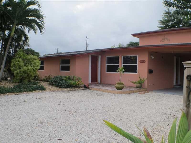 Exterior Front. Main entrance enters the lobby or carport entrance leads directly into kitchen area for groceries.