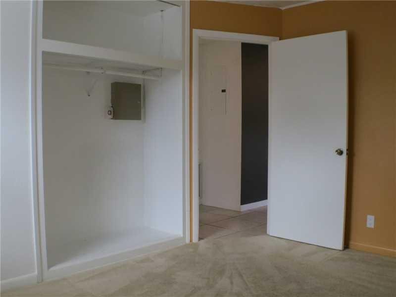Exterior Front. Guest bedroom 1 closet.