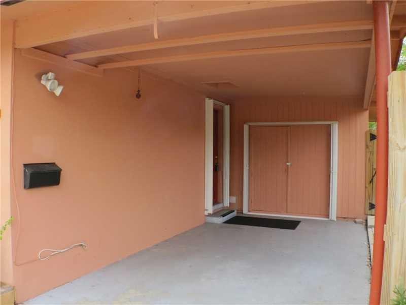 Exterior Front. Large Carport