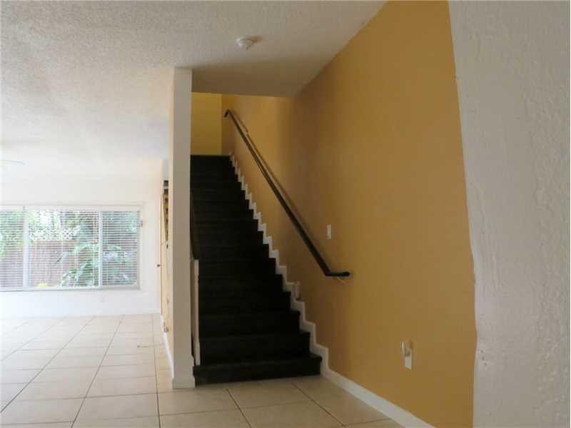 Exterior Front. Stairway to private 2nd story master suite.