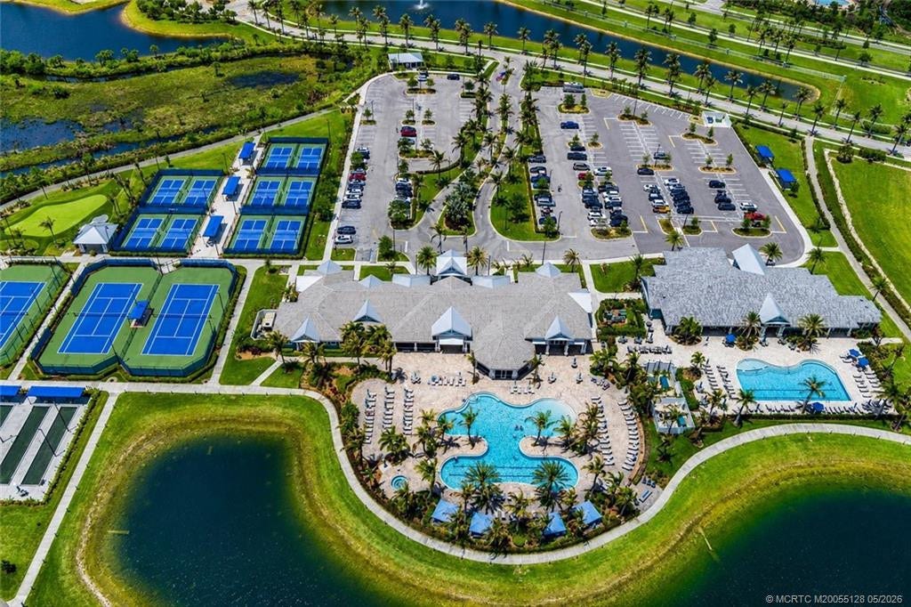 Residents of Del Webb at Tradition enjoy access to an impressive resort-style clubhouse campus featuring sparkling pools and spa, state-of-the-art fitness center, tennis and pickleball courts, social clubs, walking paths, and beautifully maintained gathering spaces designed for an active and vibrant lifestyle.