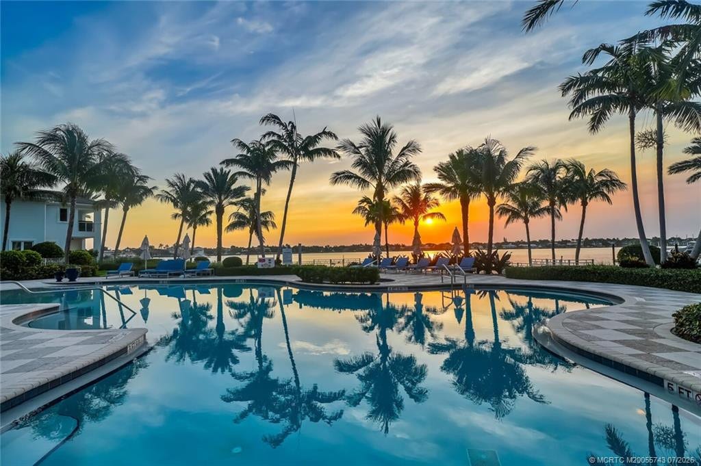 104 Water Club N, North Palm Beach, FL 33408 OVERLOOKING POOL AT SUNRISE
