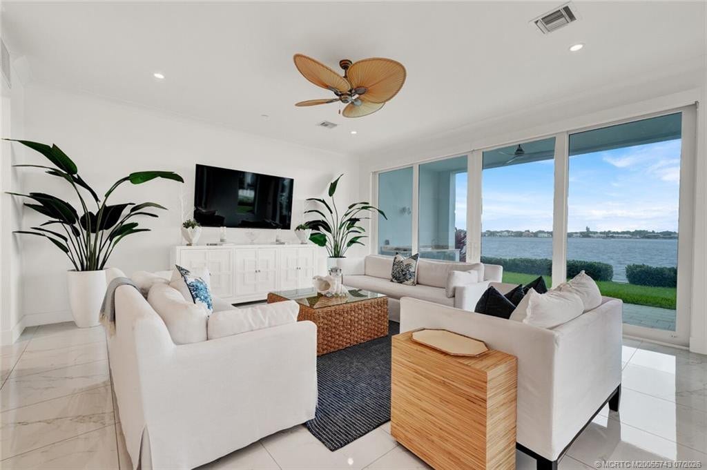 104 Water Club N, North Palm Beach, FL 33408 Living room with full water views