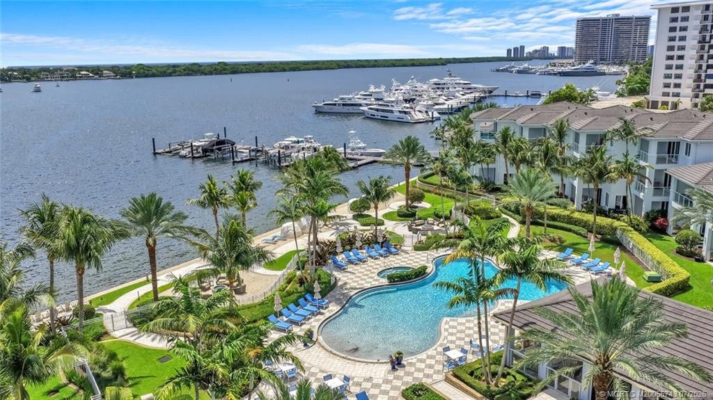 104 Water Club N, North Palm Beach, FL 33408 Resort style Amenities. Two Pools/spa, fire pit, private beach, community dock