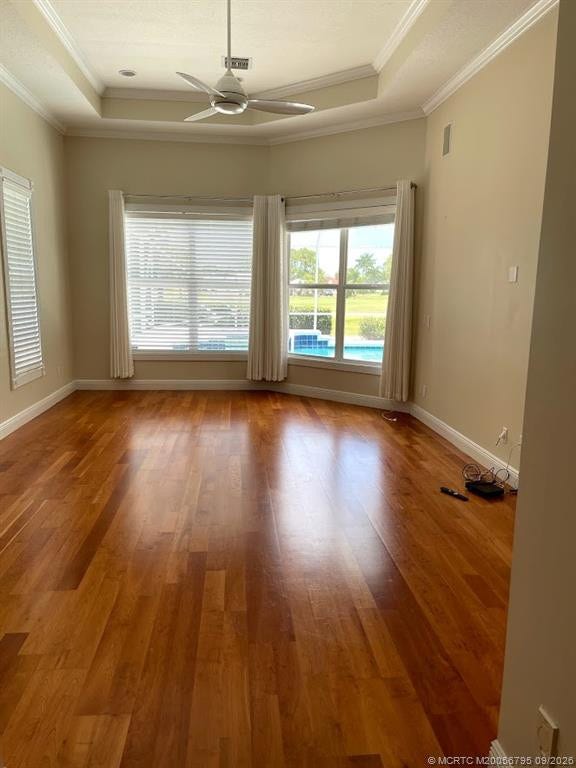 4743 SW Bermuda Way, Palm City, FL 34990 Master bedroom with beautiful laminate wood floor