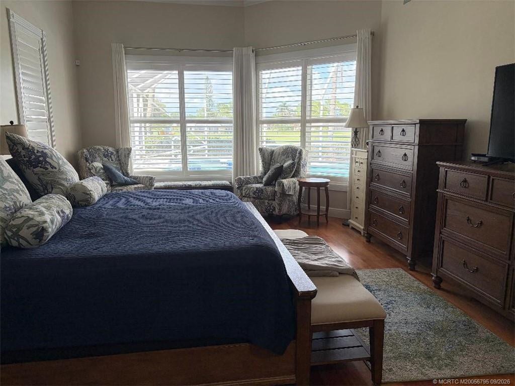 4743 SW Bermuda Way, Palm City, FL 34990 Master bedroom overlooking the pool