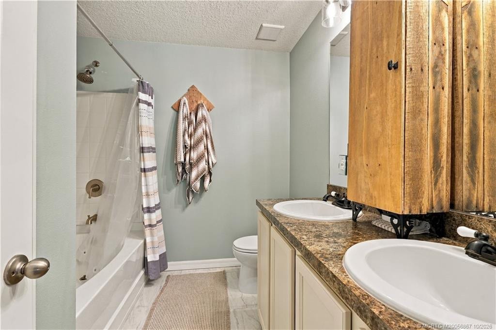 2134 SE Gaslight Street, Port St Lucie, FL 34952 Primary bath with dual-sink vanity
