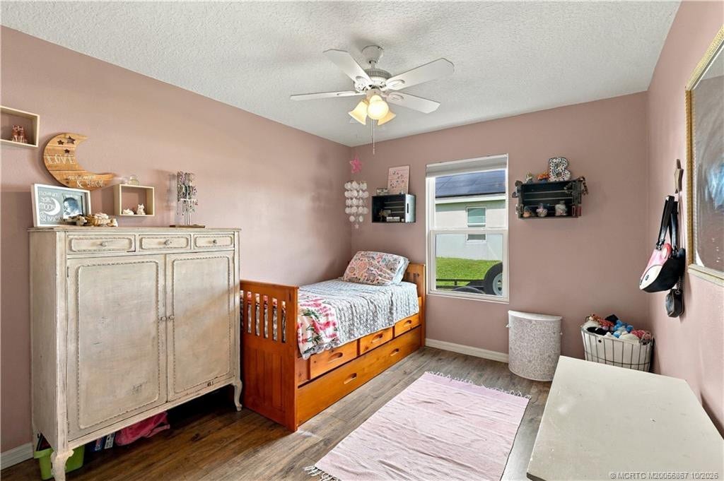 2134 SE Gaslight Street, Port St Lucie, FL 34952 Secondary bedroom with window natural light