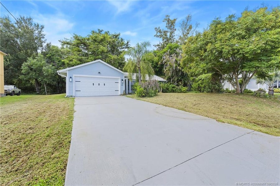 Property photo for 411 SW Namoit Place, Port St Lucie, FL