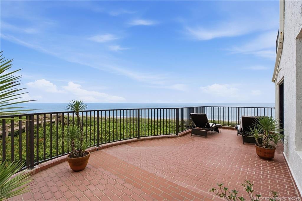 Expansive private terrace showcases sweeping unobstructed views of the Atlantic Ocean.